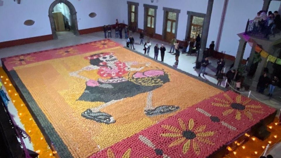 Récord Guinness tras realizar una catrina gigante con 20 mil 689 piezas de pan dulce