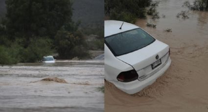 Auto es arrastrado por la corriente del río Salinas en García, NL