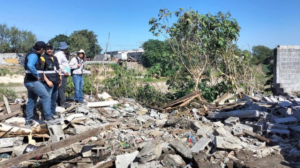 Limpieza en el predio del río Pesquería.