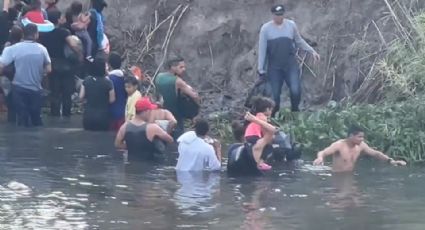 Con niños, migrantes se lanzan al Río Bravo ante fin del Título 42