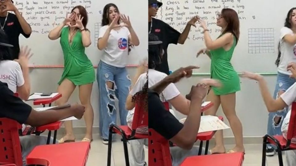 La joven maestra realizando bailes en el salón de clases.