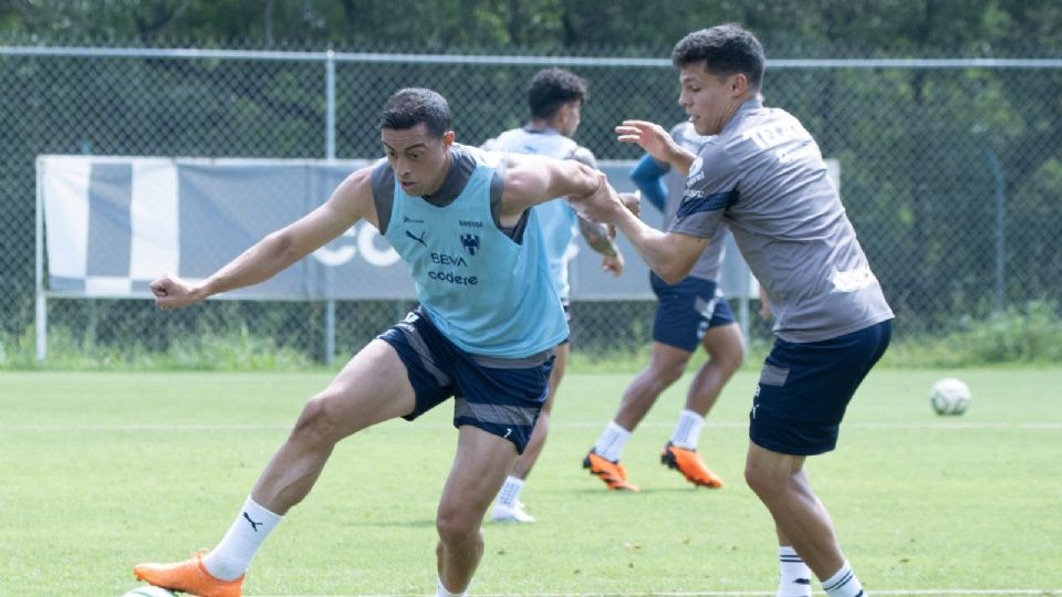 Rogelio Funes Mori y Alfonso González durante un entrenamiento