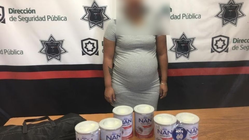 Mujer embarazada detenida.