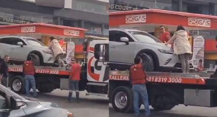 Mujer sube a grúa para evitar traslado de su camioneta al corralón en Monterrey