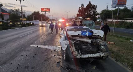 Choque de 'caballos': Remolque y Mustang impactan sobre la Carretera Nacional