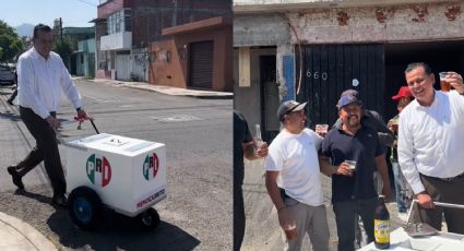 VIDEO: Líder del PRI en Michoacán regala caguamas a albañiles en la vía pública