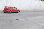 Baches mantienen presencia en avenida Miguel Alemán