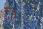 Senderista cruza sobre 'cuerda floja' entre los picos del Cerro de la Silla