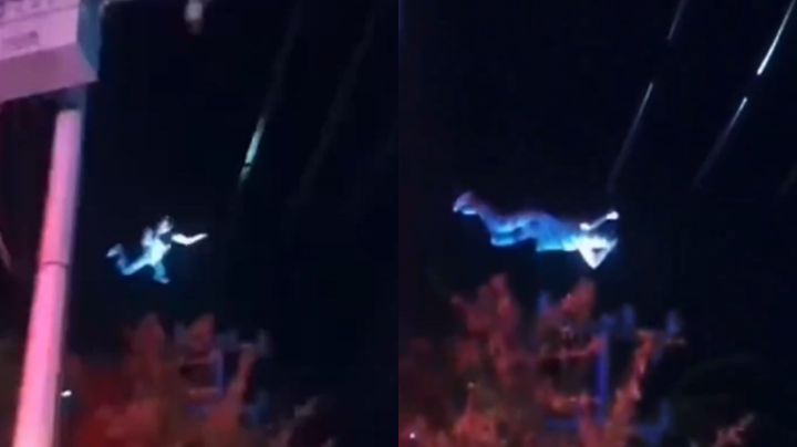 Hombre escala poste y se sujeta de cables en El Carmen, NL