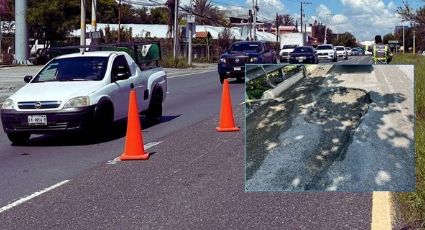 Gran bache en la Carretera Nacional causa daños a automovilistas