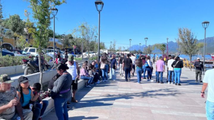 Regios disfrutan del clima cálido en la presa La Boca