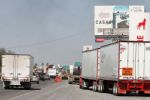 Transportistas amagan con mega bloqueo por extorsiones de Tránsito