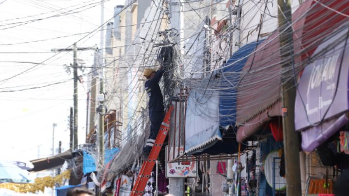 Equipo de Adrián de la Garza promete retirar un millón de metros de 'telarañas' de cables