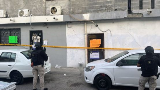 Catean casa en Monterrey; encuentran un arma de fuego y drogas
