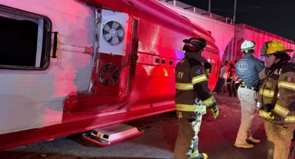 Choque entre autobús de pasajeros y tren deja un muerto y 26 heridos