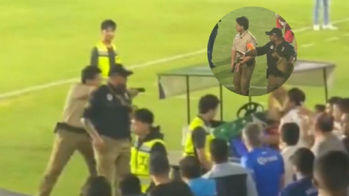 Uniformado amaga con pistola a aficionados de Celaya en la Liga de Expansión | VIDEOS